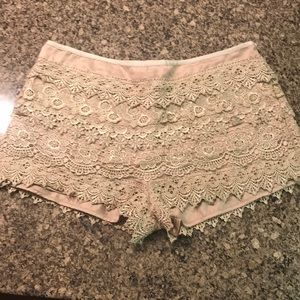 Tan lace shorts.
